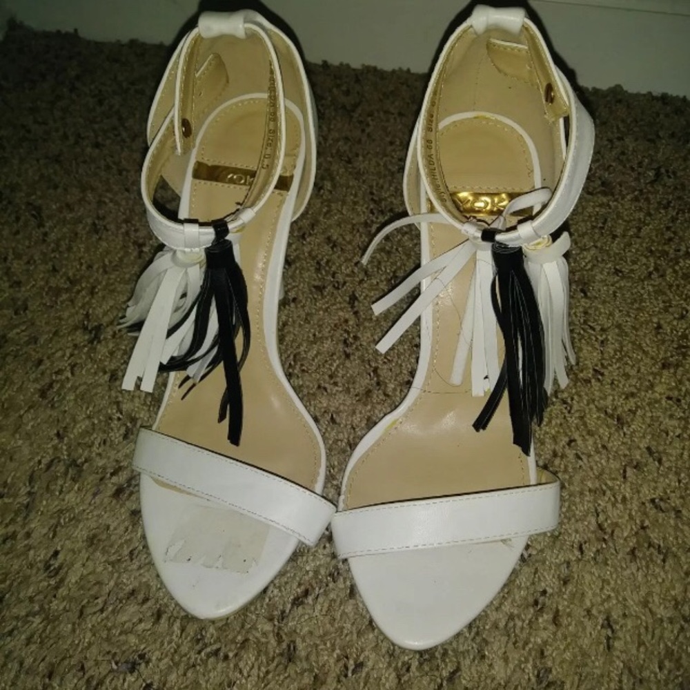 White and black heels